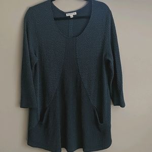 Dark teal, long tunic with front pockets.